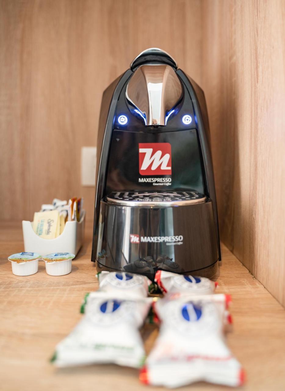 فندق Senator بويرتو بلاتا المظهر الخارجي الصورة A Maxespresso machine
